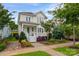 Charming two-story home with manicured lawn, front porch, and brick sidewalk at 827 Digby Rd, Rock Hill, SC 29730