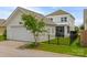 Exterior of home showing a two-car detached garage with a fenced yard and outdoor seating area at 827 Digby Rd, Rock Hill, SC 29730