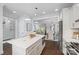 Open concept kitchen with a center island, stainless appliances, and access to the dining room at 827 Digby Rd, Rock Hill, SC 29730