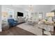 Bright living room featuring a comfortable sectional, stylish furniture, and large windows at 827 Digby Rd, Rock Hill, SC 29730