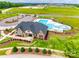 Aerial view of community clubhouse and pool area with ample seating and sunbathing at 827 Digby Rd, Rock Hill, SC 29730