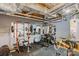 Basement gym with exercise equipment and mirrors on the walls for home fitness at 1032 Spyglass Ln, Waxhaw, NC 28173