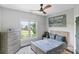 Relaxing bedroom with a stadium theme and a window offering a view of the outdoors at 1032 Spyglass Ln, Waxhaw, NC 28173