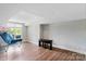 Spacious bonus room with a basketball hoop and a keyboard, perfect for recreation at 1032 Spyglass Ln, Waxhaw, NC 28173