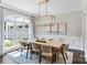 Dining room with lots of light and a dining table with seating for 8 at 1032 Spyglass Ln, Waxhaw, NC 28173