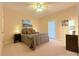 Comfortable bedroom with neutral walls, carpet, and furnishings at 11646 Hidden Forest Ln, Davidson, NC 28036