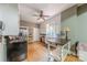The kitchen features stainless appliances, hardwood flooring, and a table with countertop at 119 Foote St, Chester, SC 29706