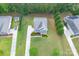 Lovely two-story home featuring a well manicured lawn and long driveway in a wooded, private neighborhood at 11922 Kimberfield Rd, Matthews, NC 28105
