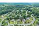 This aerial view showcases the neighborhood's layout and the lush greenery that surrounds the property at 11922 Kimberfield Rd, Matthews, NC 28105