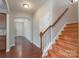 Inviting entryway with hardwood floors and staircase, leading to the main living areas at 11922 Kimberfield Rd, Matthews, NC 28105