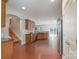 Spacious kitchen with hardwood floors, stainless steel appliances, and wooden cabinets at 11922 Kimberfield Rd, Matthews, NC 28105