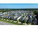 Aerial view of a neighborhood showcasing a variety of modern single Gathering homes at 11965 Hambright Rd, Huntersville, NC 28078