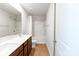 Bathroom featuring double sink vanity and shower/tub combo with tile flooring at 11965 Hambright Rd, Huntersville, NC 28078