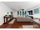 Bright living room featuring hardwood floors and a comfortable seating area at 11965 Hambright Rd, Huntersville, NC 28078