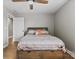 Cozy bedroom with a comfortable bed, hardwood floors, and ample natural light at 12205 Hollinhope Dr, Charlotte, NC 28278