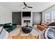 Inviting living room with fireplace, comfortable seating, and an open layout at 12205 Hollinhope Dr, Charlotte, NC 28278