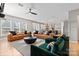 Spacious living room featuring comfortable seating, modern decor, and an open-concept design at 12205 Hollinhope Dr, Charlotte, NC 28278
