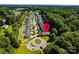 Aerial view of the home nestled in a lush, green neighborhood, offering a serene and private setting at 141 Aberdeen Dr, Troutman, NC 28166