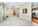 Spacious living room with high ceilings and large windows, offering ample natural light at 141 Aberdeen Dr, Troutman, NC 28166