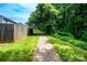 Neighborhood sidewalk surrounded by trees and lawn at 141 Aberdeen Dr, Troutman, NC 28166