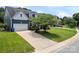Attractive home showing the driveway, attached garage, and well-maintained lawn at 162 Castles Gate Dr, Mooresville, NC 28117