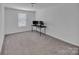 Bright bedroom with a neutral color scheme and plush carpeting, ideal for a serene living space at 171 Old Harbor Dr, Mount Gilead, NC 27306