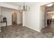 A dining room features hardwood floors and a view of the kitchen at 171 Old Harbor Dr, Mount Gilead, NC 27306