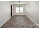 A dining room features hardwood floors and plenty of natural light at 171 Old Harbor Dr, Mount Gilead, NC 27306