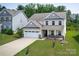 Beautiful two-story home with a well-manicured lawn and two-car garage, great curb appeal at 171 Old Harbor Dr, Mount Gilead, NC 27306