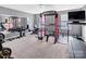 A home gym features a treadmill, weights, and a full mirror at 171 Old Harbor Dr, Mount Gilead, NC 27306