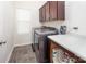 The laundry room features a modern washer and dryer at 171 Old Harbor Dr, Mount Gilead, NC 27306