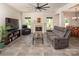 Comfortable living room with a fireplace, plush seating, large windows, and modern decor at 171 Old Harbor Dr, Mount Gilead, NC 27306