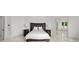 Bedroom with white walls, wood floors, and dark wood bedside tables at 173 Rehoboth Ln, Mooresville, NC 28117