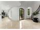 Elegant foyer featuring a grand staircase, marble floors, and designer finishes at 173 Rehoboth Ln, Mooresville, NC 28117