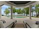 Stunning outdoor patio view with a lake and an inground pool at 173 Rehoboth Ln, Mooresville, NC 28117