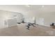Bonus room featuring carpet, neutral paint and exercise equipment at 1830 Alden Oaks Ln, Charlotte, NC 28270