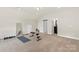 Bonus room featuring carpet, neutral paint and exercise equipment at 1830 Alden Oaks Ln, Charlotte, NC 28270