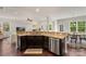 Spacious kitchen and breakfast nook featuring granite countertops and stainless steel appliances at 1830 Alden Oaks Ln, Charlotte, NC 28270