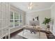 Bright office space with large window, modern desk, and decorative plant at 1830 Alden Oaks Ln, Charlotte, NC 28270