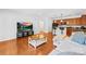 Cozy living room with a view into kitchen and great natural light at 1903 Kenilworth Ave # 104A, Charlotte, NC 28203