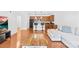 Open-concept living space with a breakfast bar connecting to the kitchen area at 1903 Kenilworth Ave # 104A, Charlotte, NC 28203