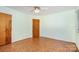 Empty bedroom showcases hardwood floors and a ceiling fan at 1925 Montclair Ave, Gastonia, NC 28054