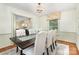 Tastefully decorated dining area showing a view into the living room at 1925 Montclair Ave, Gastonia, NC 28054