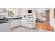 Bright kitchen featuring white cabinets, classic oven, and an open layout at 1925 Montclair Ave, Gastonia, NC 28054