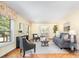 Bright living room showcasing hardwood floors, neutral decor, and an inviting seating arrangement at 1925 Montclair Ave, Gastonia, NC 28054