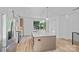 Open kitchen featuring an oversized island with stainless steel appliances at 209 Keswick Ave, Charlotte, NC 28206