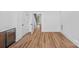 Open space with sleek floors, beverage refrigerator, and view of stairway at 209 Keswick Ave, Charlotte, NC 28206