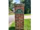 Charming brick pillar featuring the house number and street name at 2104 Farmbrook Dr, Statesville, NC 28625