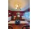Elegant dining room with chandelier, buffet, and ample natural light through large window at 2104 Farmbrook Dr, Statesville, NC 28625
