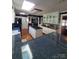 Stylish kitchen with granite counters, large island with cooktop, and modern appliances at 2104 Farmbrook Dr, Statesville, NC 28625